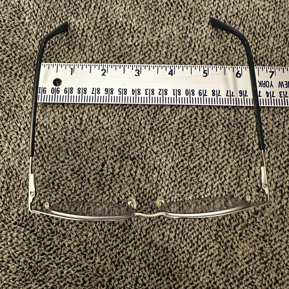 Calvin Klein youth eyeglasses and case.